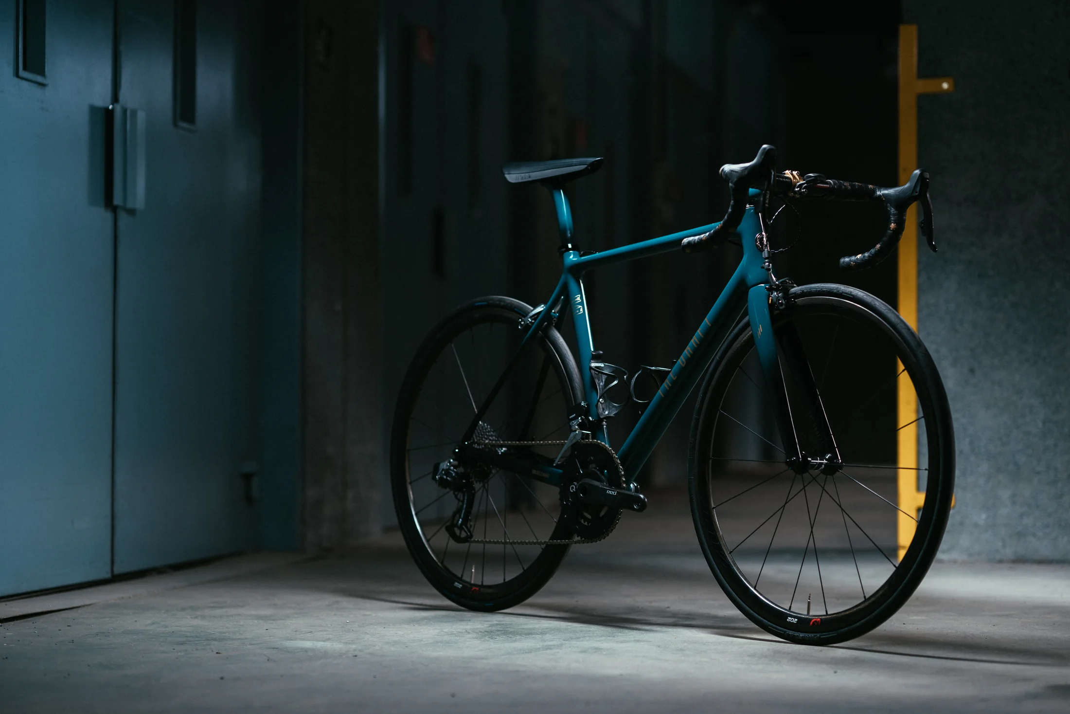 Green and black El Chako photographed from the front at an angle.